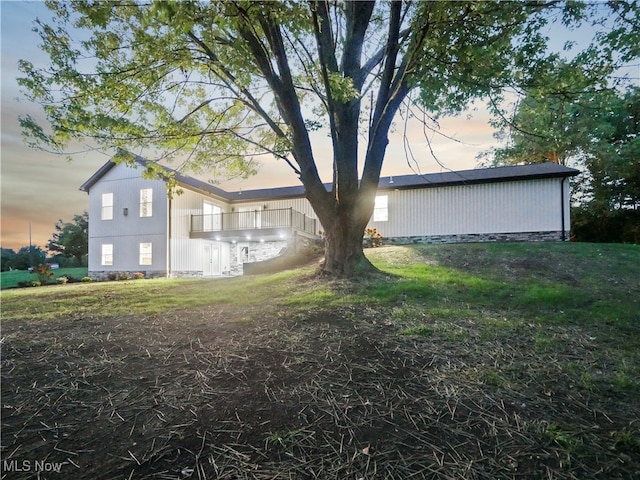 view of property exterior at dusk