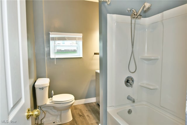 full bathroom featuring shower / bathtub combination, vanity, toilet, and hardwood / wood-style flooring