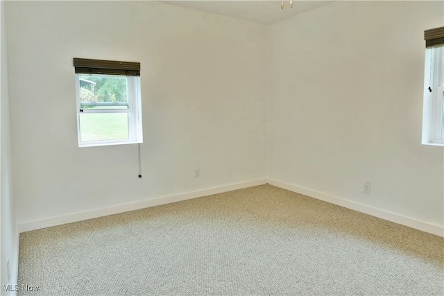 empty room featuring carpet floors