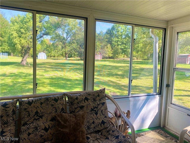 unfurnished sunroom with a wealth of natural light