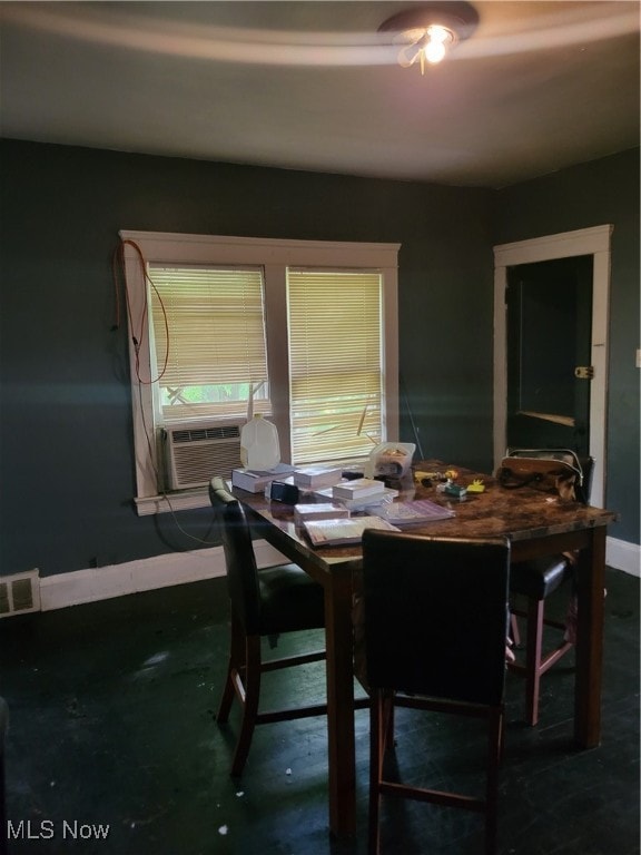 dining room with cooling unit