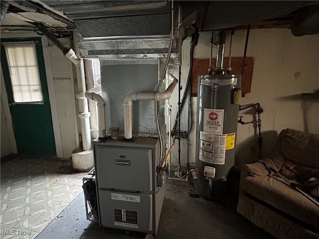 utility room featuring gas water heater