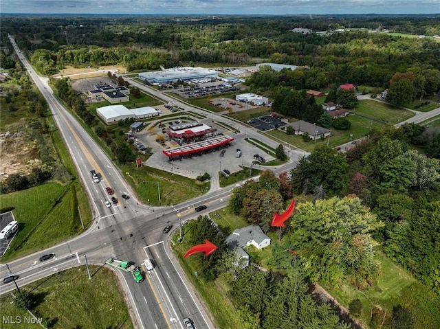 6942 State Route 44, Ravenna, OH 44266 - drone / aerial view with a wooded view