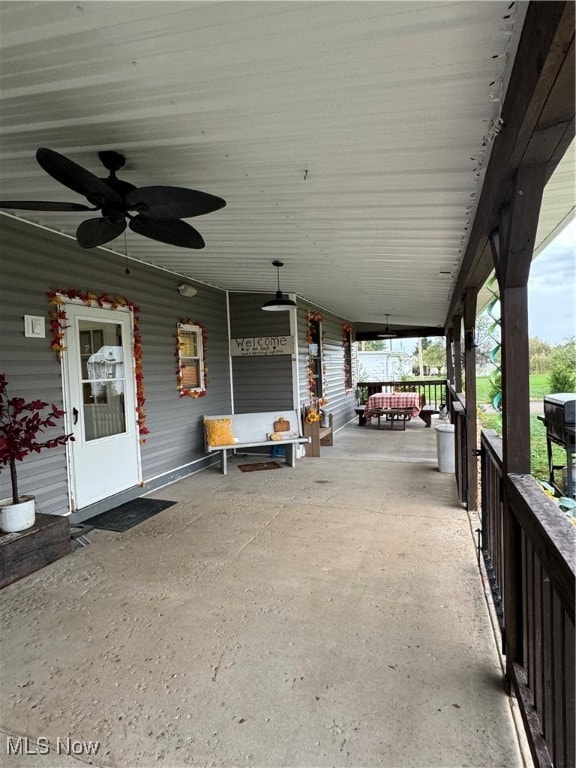 view of patio / terrace featuring ceiling fan