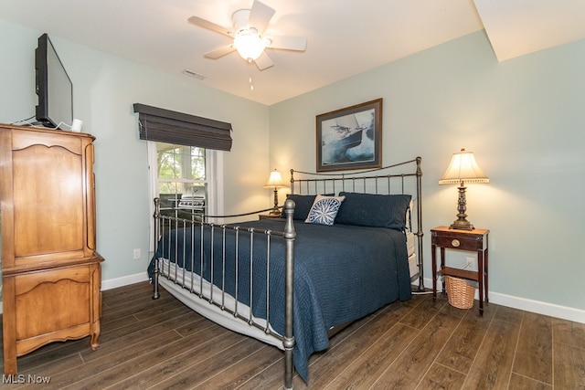 bedroom with dark wood-type flooring and ceiling fan