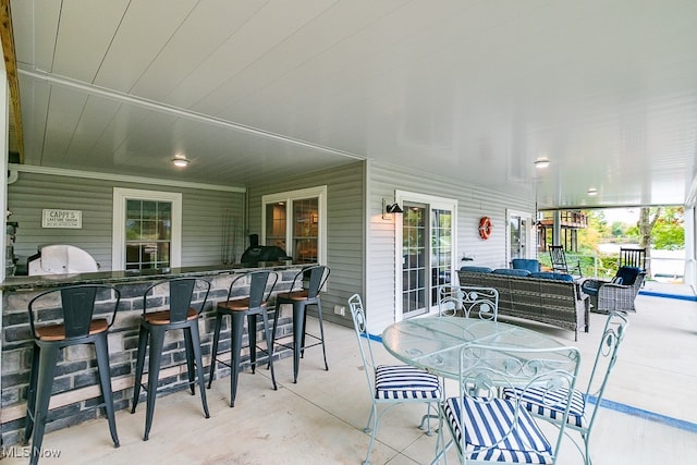 view of patio / terrace with exterior bar