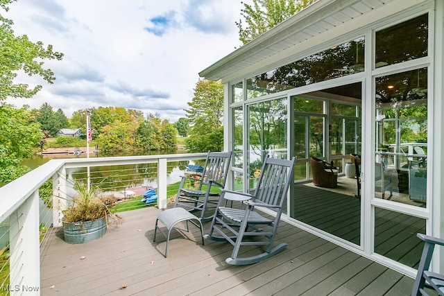 wooden terrace with a sunroom