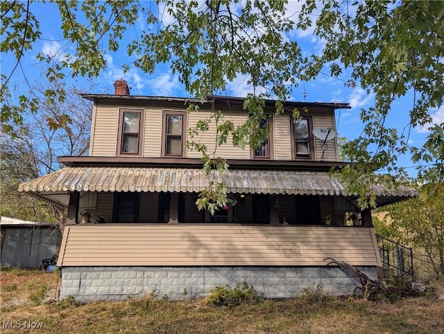 10206 Gillespie Run Rd, Petroleum, WV 26161 - view of front facade with a chimney