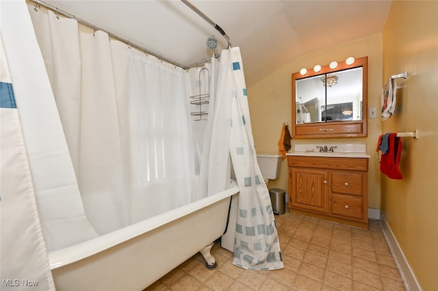 bathroom with shower / bath combo with shower curtain and vanity