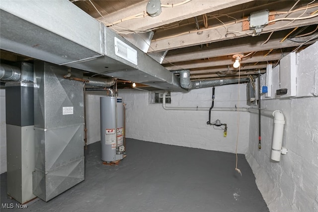 basement featuring water heater and heating unit