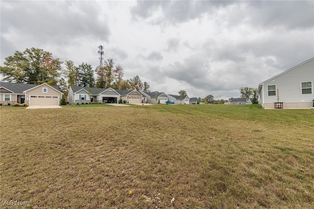 view of yard with a garage