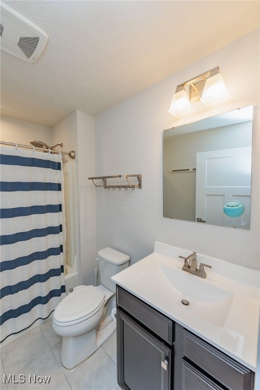 full bathroom featuring vanity, tile patterned flooring, toilet, and shower / bathtub combination with curtain