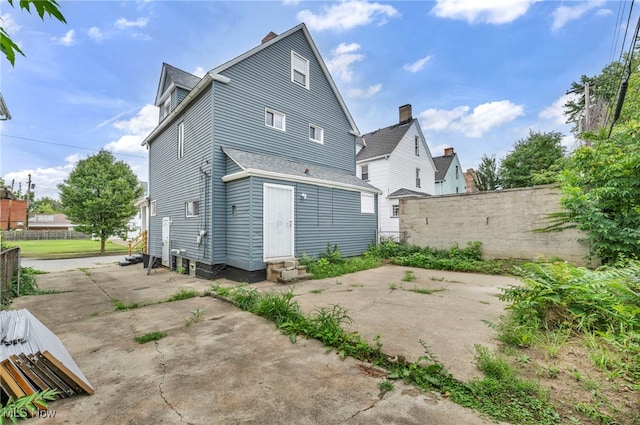 rear view of house with a patio area