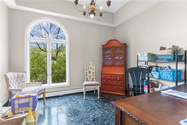 office featuring a tray ceiling and a chandelier