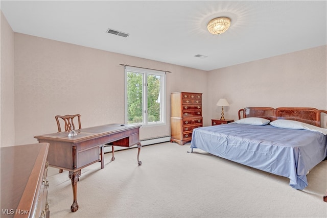 bedroom with a baseboard radiator and light colored carpet