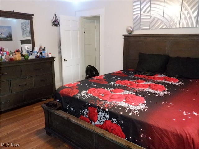 bedroom featuring wood-type flooring