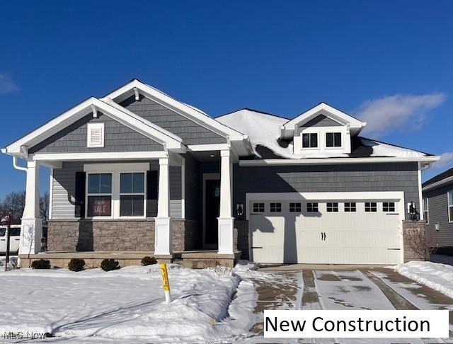 craftsman-style house with a garage