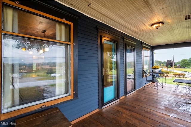 wooden deck with a porch