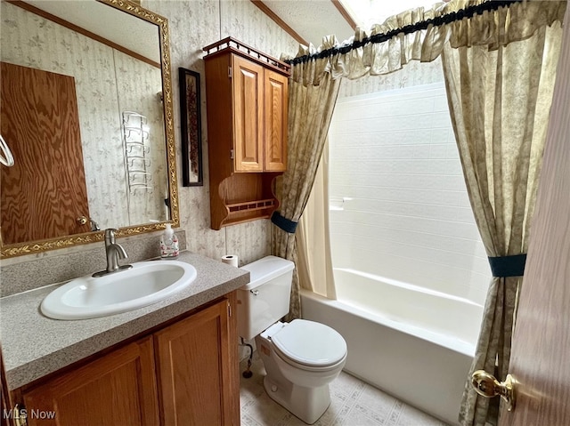 full bathroom featuring shower / bath combo, vanity, and toilet