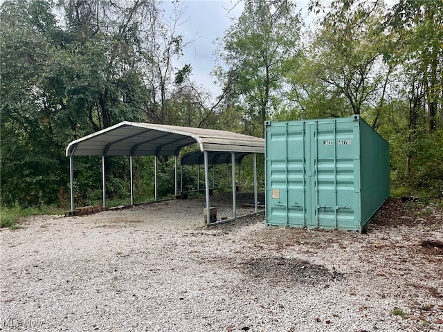 view of outdoor structure with a carport