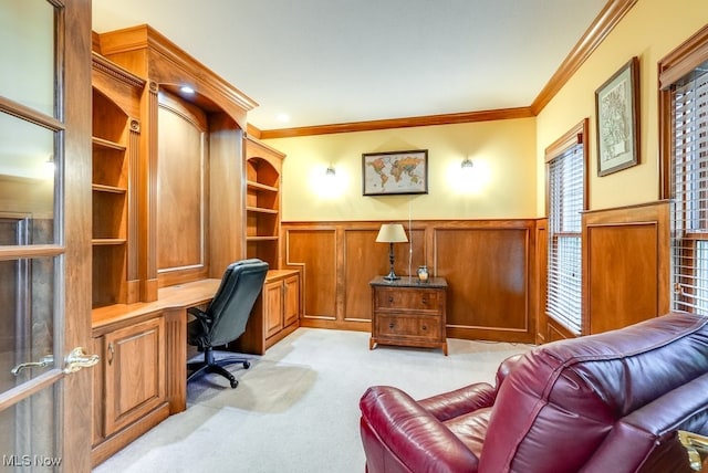 office area featuring light carpet and crown molding