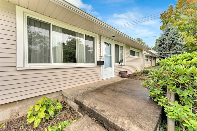 view of home's exterior with a patio area