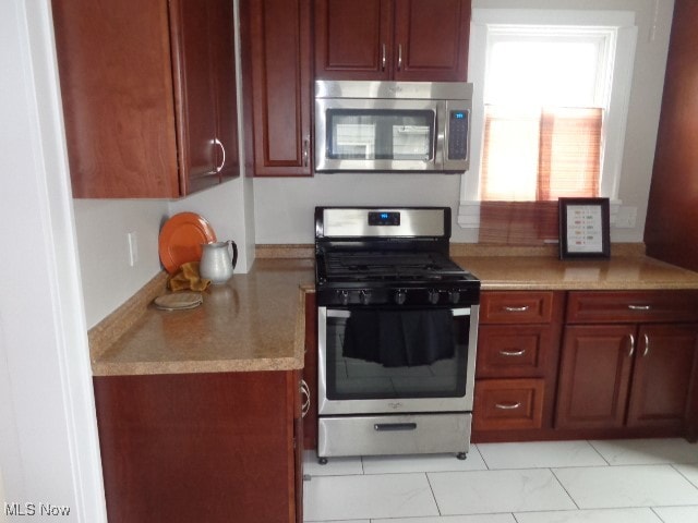 kitchen with appliances with stainless steel finishes