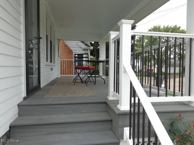 deck with covered porch