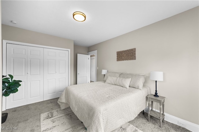 bedroom featuring a closet and carpet