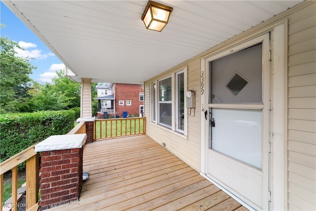 wooden deck featuring a porch