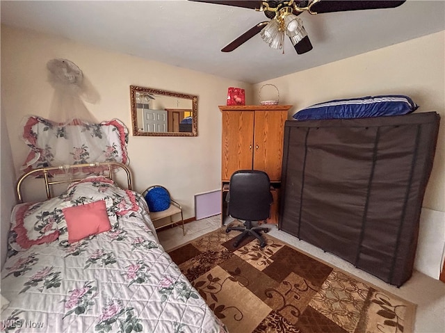 bedroom featuring ceiling fan