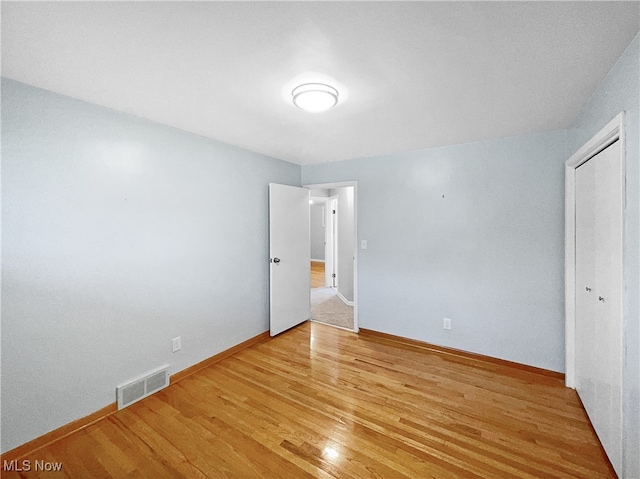 unfurnished bedroom with light hardwood / wood-style flooring