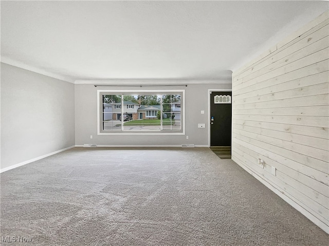 unfurnished room with carpet