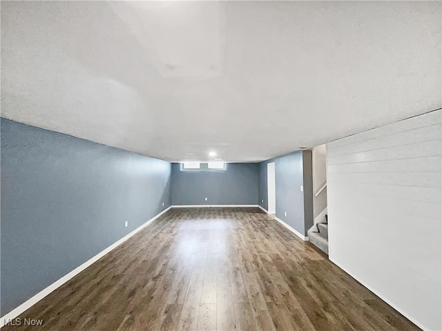 basement featuring dark wood-type flooring