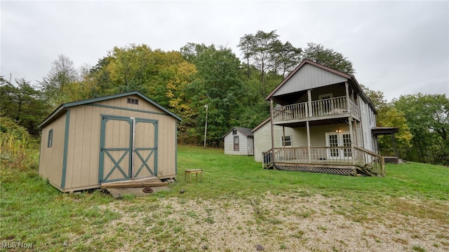 view of outdoor structure featuring a lawn