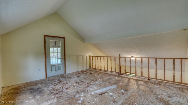 bonus room with vaulted ceiling