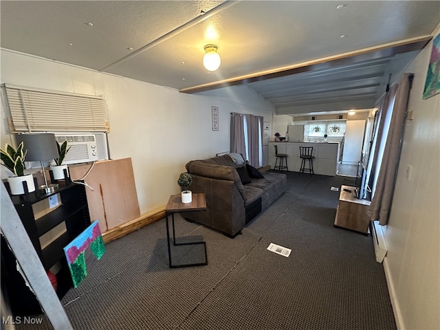 living room with a baseboard radiator, cooling unit, and vaulted ceiling