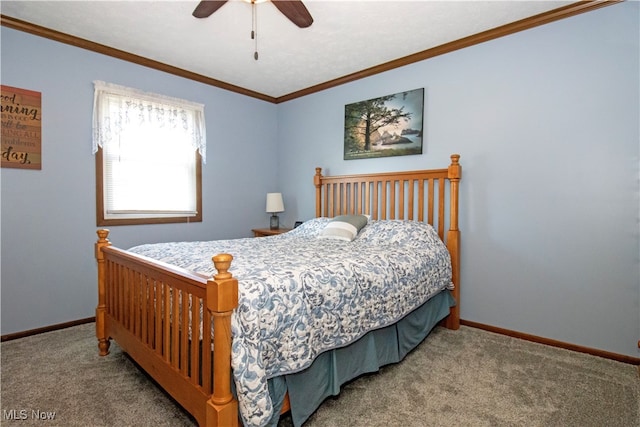 bedroom with carpet, ceiling fan, and crown molding