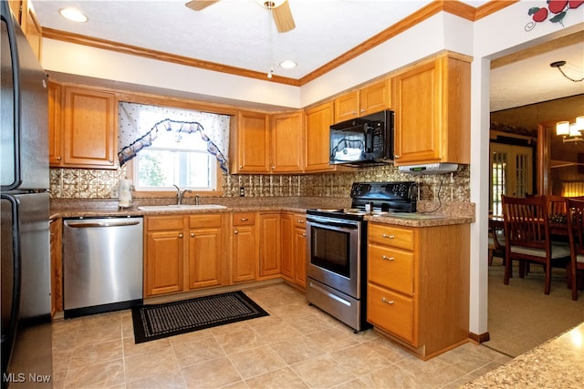 kitchen featuring sink, stainless steel appliances, light tile patterned floors, ornamental molding, and ceiling fan