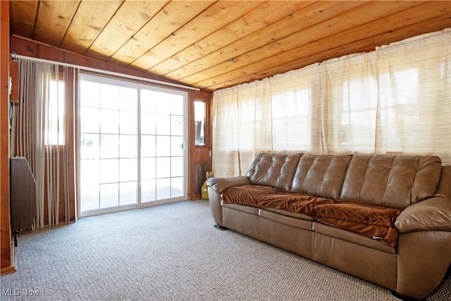 carpeted living room featuring wooden ceiling and lofted ceiling