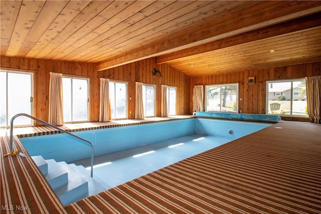 view of pool featuring a hot tub