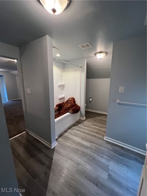 hallway featuring hardwood / wood-style floors