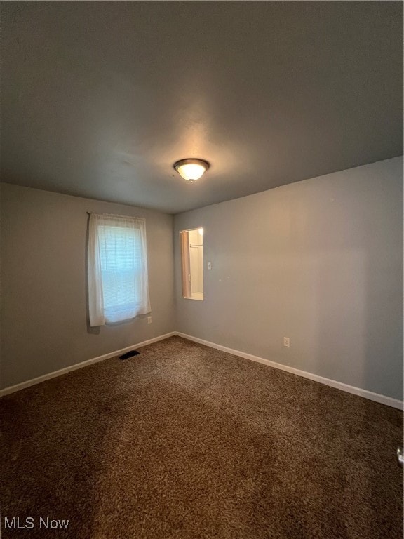 view of carpeted spare room