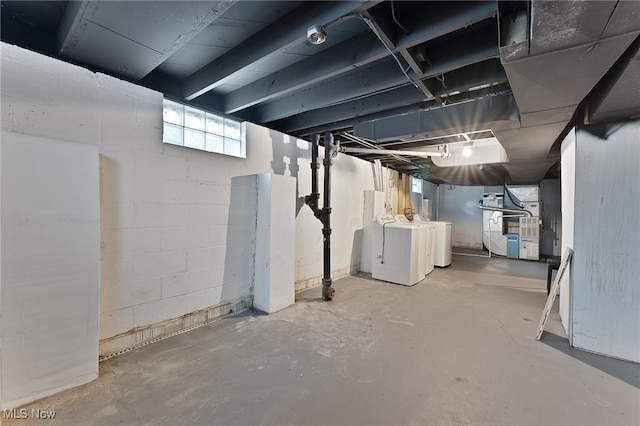 basement with washing machine and dryer