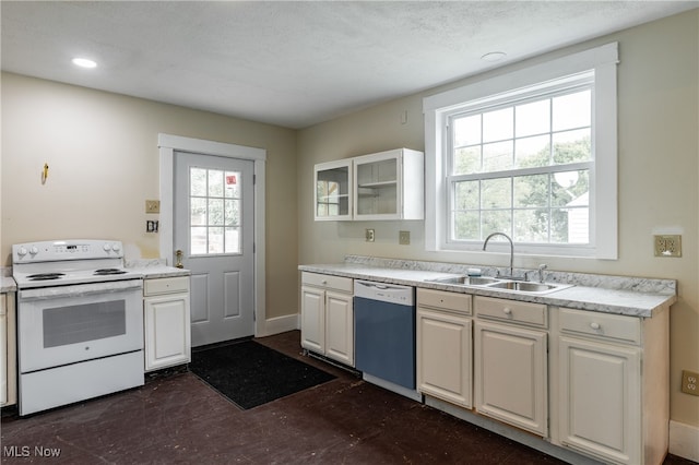 kitchen with white cabinetry, a textured ceiling, stainless steel dishwasher, white electric range oven, and sink