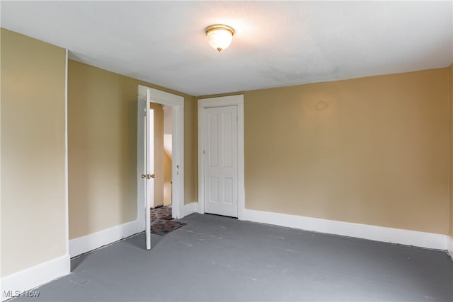 unfurnished bedroom featuring a closet