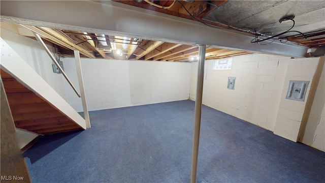 basement with dark colored carpet