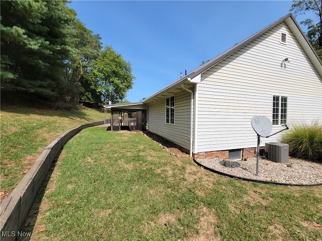 view of yard with central AC