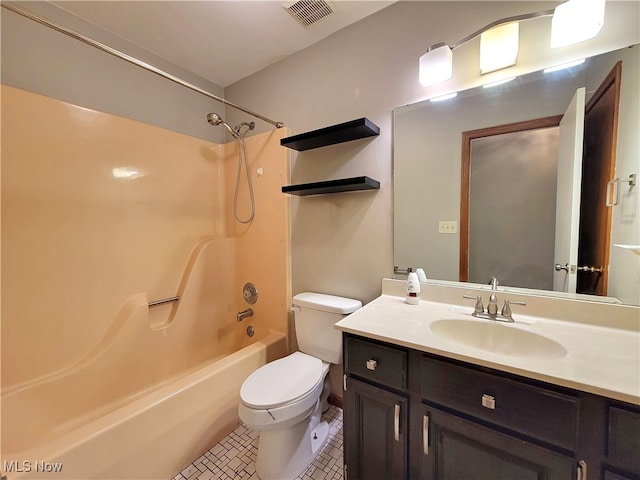 full bathroom with  shower combination, vanity, toilet, and tile patterned floors