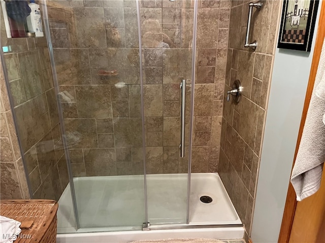 bathroom with an enclosed shower